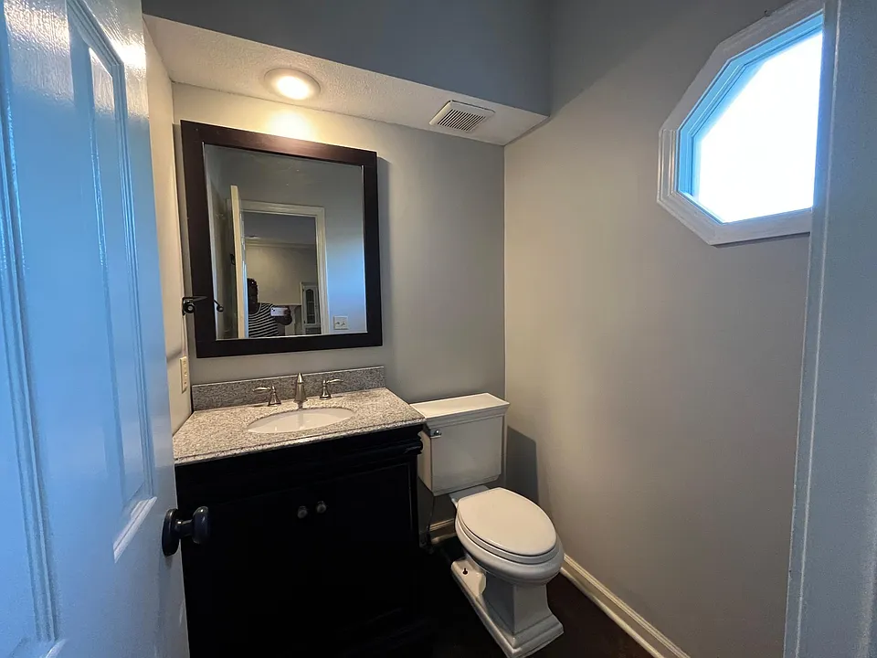 1/2 guest bath located off the living room