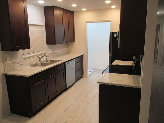 New kitchen with pantry/washer and dryer area.