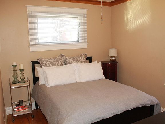 Primary bedroom. 12'x10' (including built-in closet). Queen bed pictured.