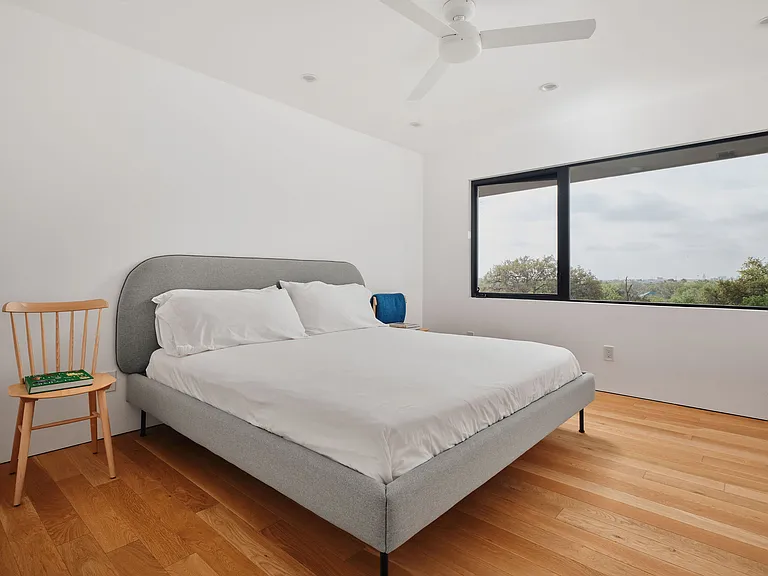 Secondary bedroom with beautiful views of downtown and the park across the street.