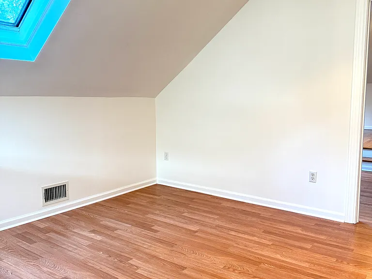 Office den with skylight.