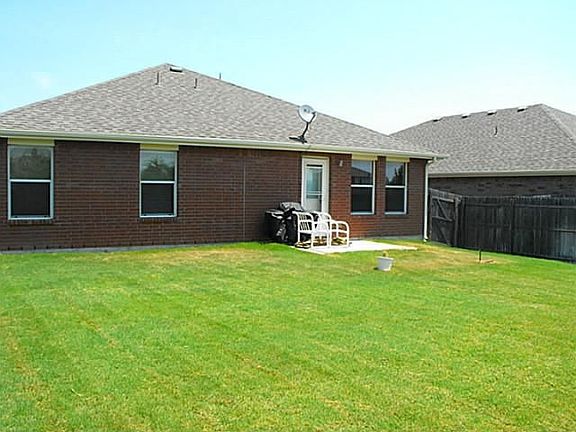 Rear yard with privacy wood fence