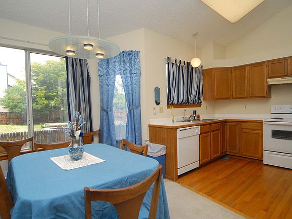 Kitchen and Dining Area. Fairly new dishwasher and elec stove.
