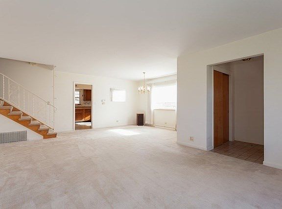 LIVING AND DINING ROOM, FOYER WITH CLOSET