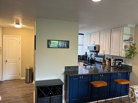 Kitchen and downstairs half bath.