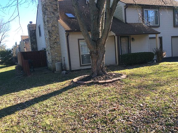 FRONT WITH BEAUTIFUL TREE