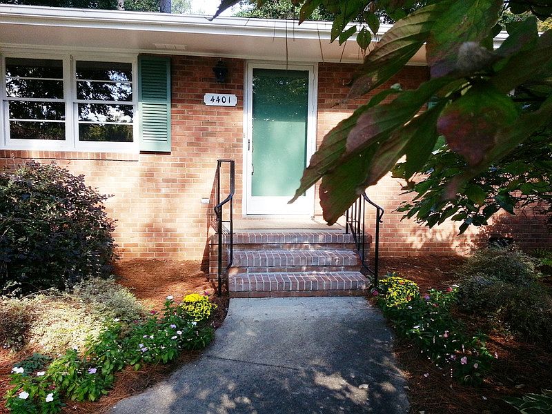 This predominately brick home is situated on a level one third acre site and is surrounded by gorgeous gardens. Walk to Brooks elementary school.
