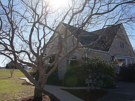 west side view w/garage