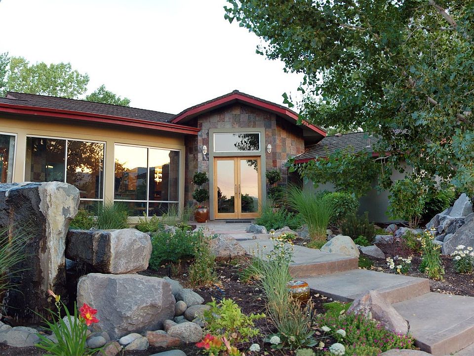 Entrance with water features and gardens
