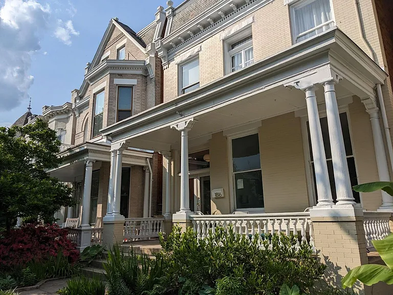 Front of house (not your unit). Your entrance is in the back, but you have a code to the side alley to the right that residents use to enter Grace Street and your new Fan life!