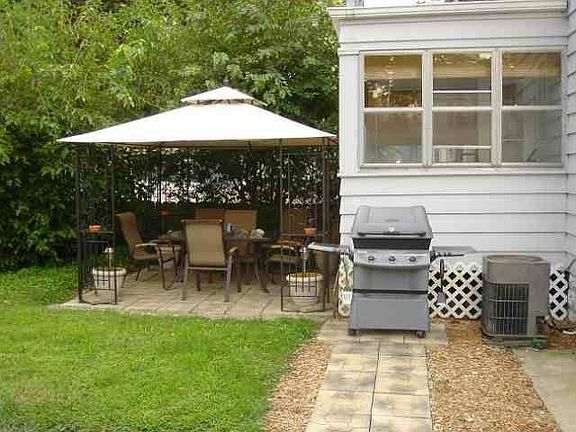 fenced in yard with patio