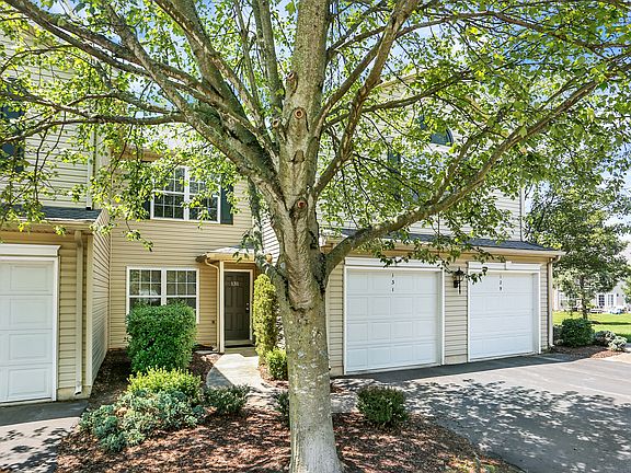 Front of house. 1 care garage