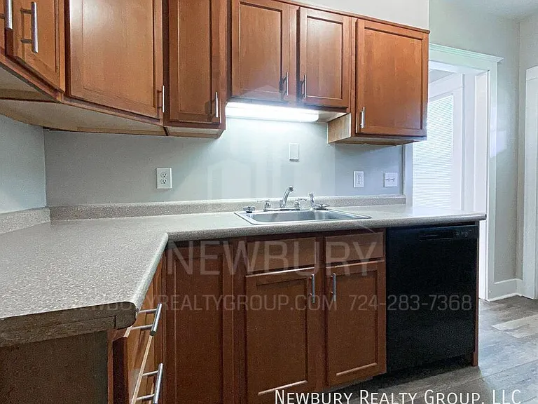 313 Wilson Ave — Photo 16