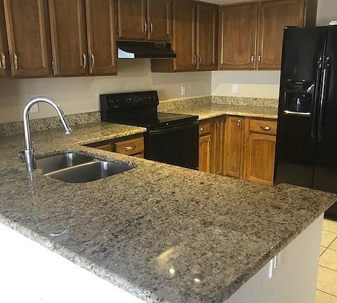 Kitchen with granite counter tops and all appliances included