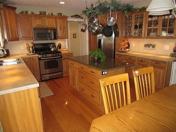 KITCHEN WITH GRANITE ISLAND/WOOD