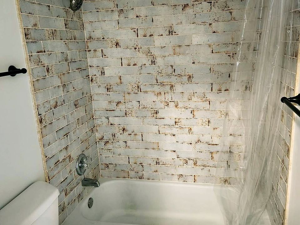 Custom bath with imported tile and marble floor