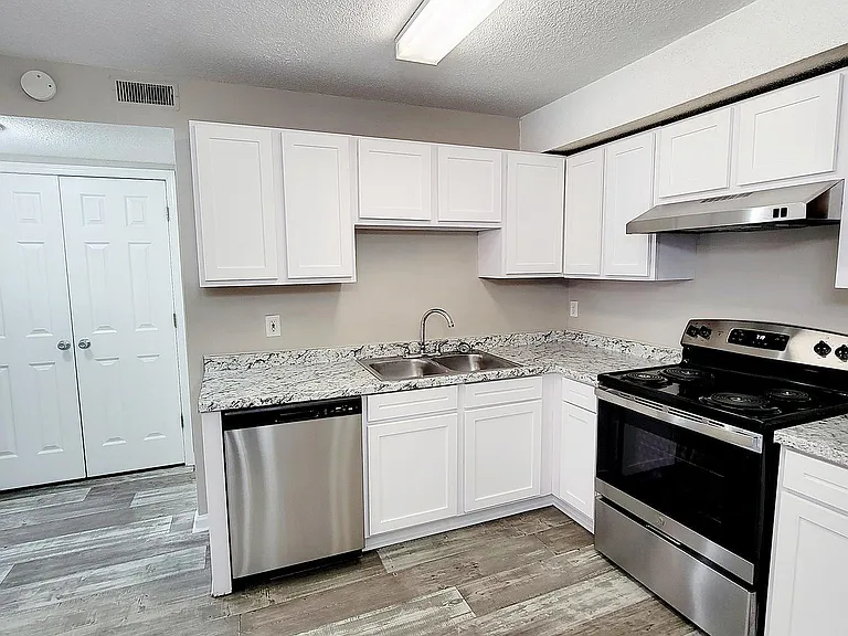 Kitchen with granite counters and stainless appliances