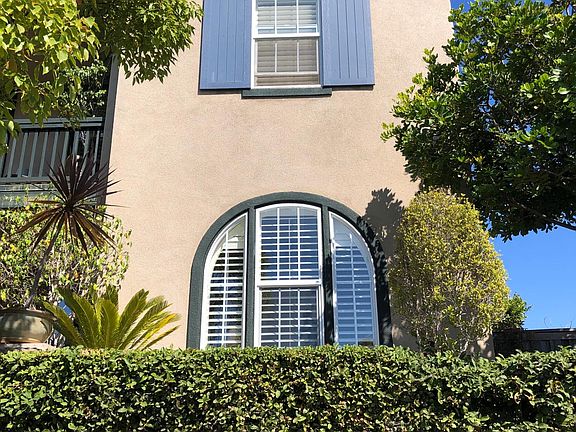Arched window is the location of the private studio.
