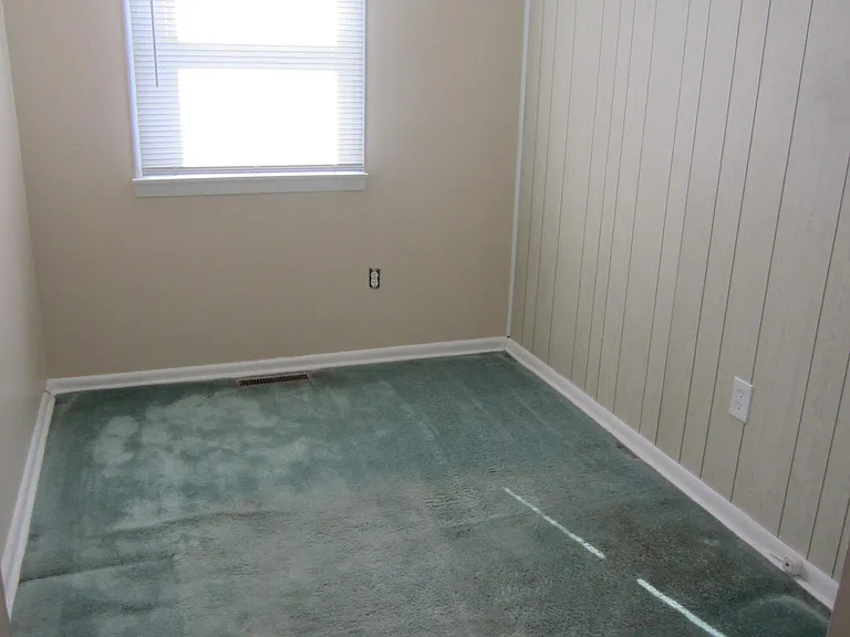 Smallest bedroom with ceiling fan as there are in the other bedrooms on the upper level. Not showing is the closet as well as the entrance. Small but enough room for a double bed and a dresser that once in this room.