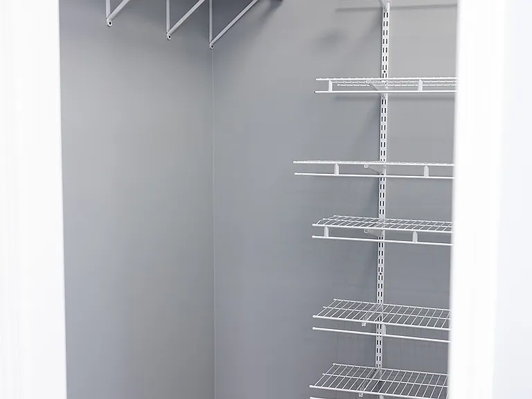 Primary Bedroom walk in closet