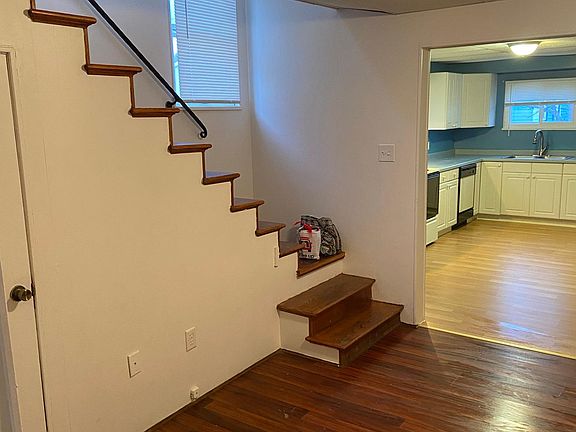 Dining room, left side, steps leading upstairs