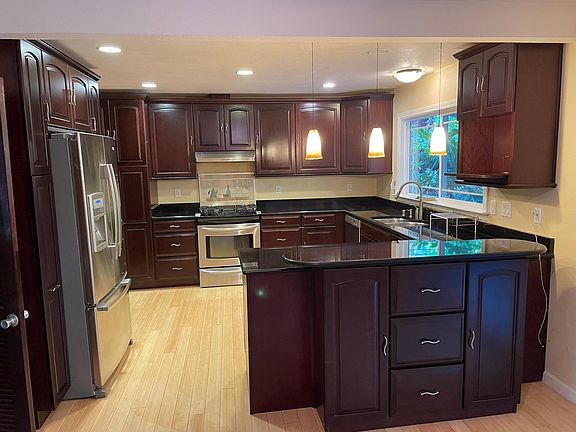 A thoughtfully redesigned kitchen that maximizes efficiency, space, and light.
