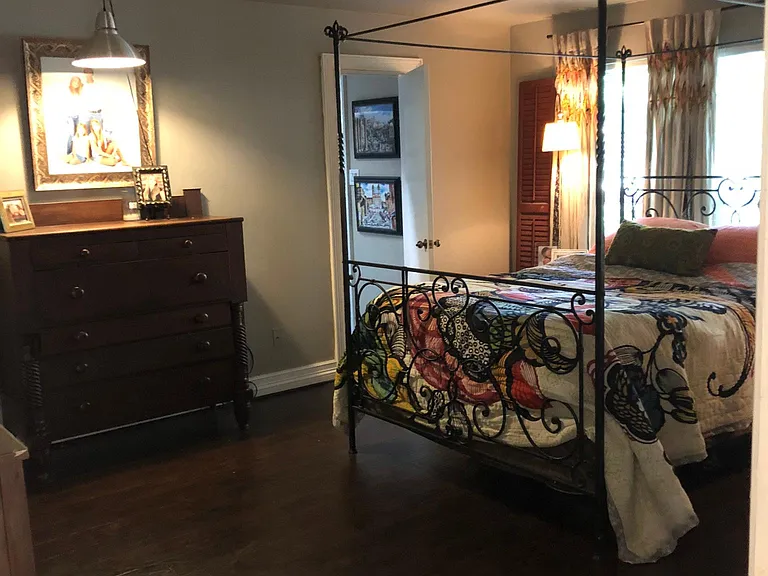 Large hardwood master bedroom