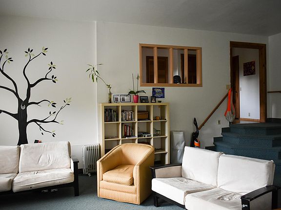 Downstairs unit has sunken Livingroom and new kitchen.