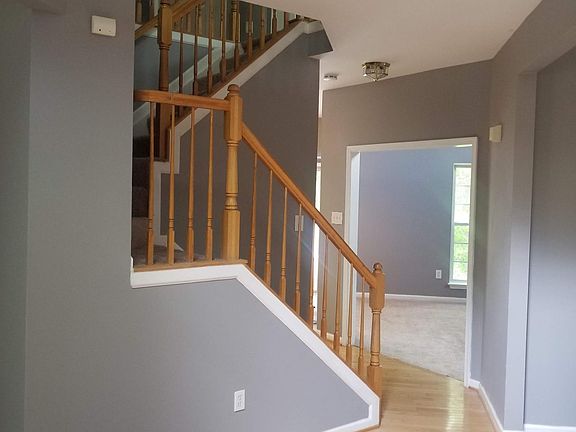 Foyer with hardwood floors
