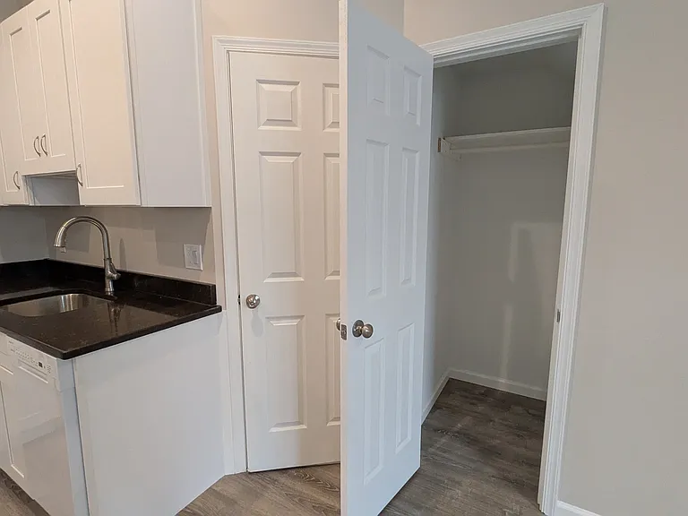 Entry way and kitchen right off the kitchen