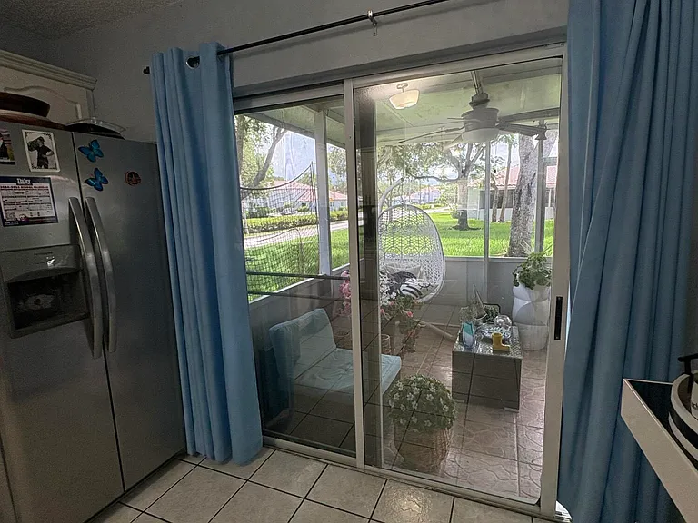 702 NW 208th Ter — Photo 10