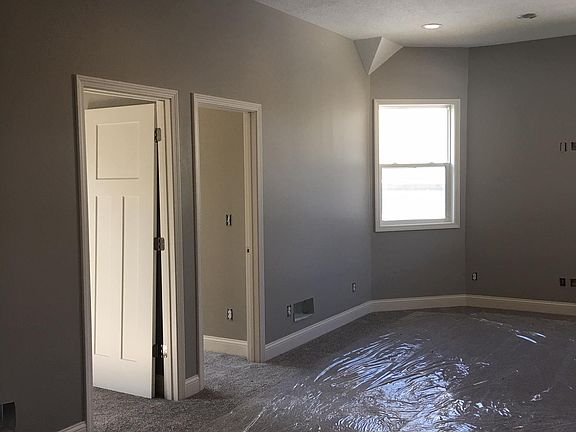 Doors leading to 2 bedrooms