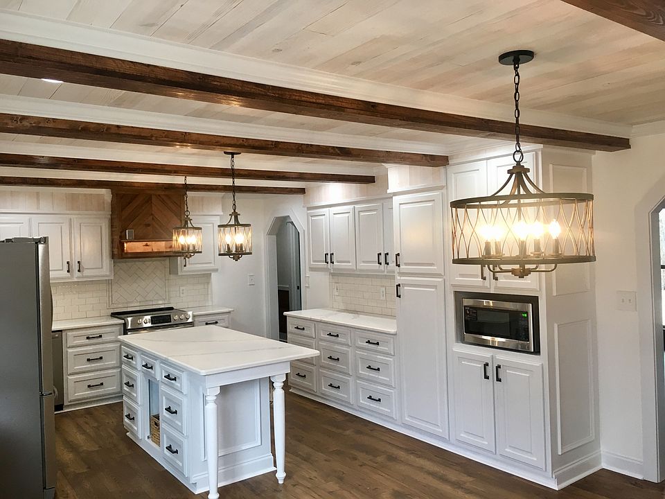 Kitchen has QUARTZ COUNTERS 