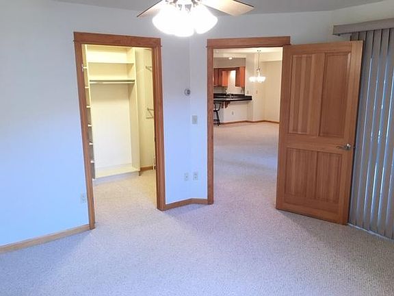 From left to right: walk in closet; view from master toward living room; door to terrace on the far right.