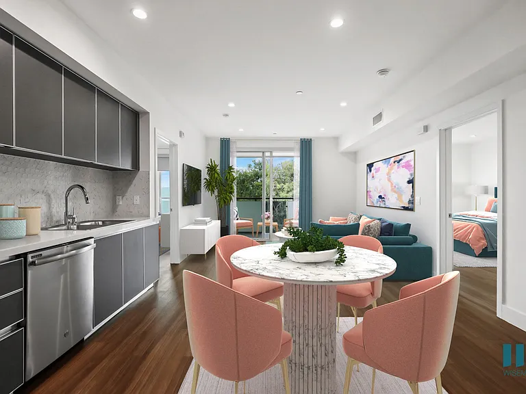 Open-Concept Kitchen, Dining, and Living Room with Patio