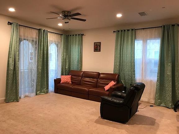 Living room with patio access.