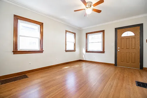 An Adorable 2BR Brick Home with Original Hardwoods, Custom Bath, Full Basement, Yard and 1 Car Ga... — Photo 3