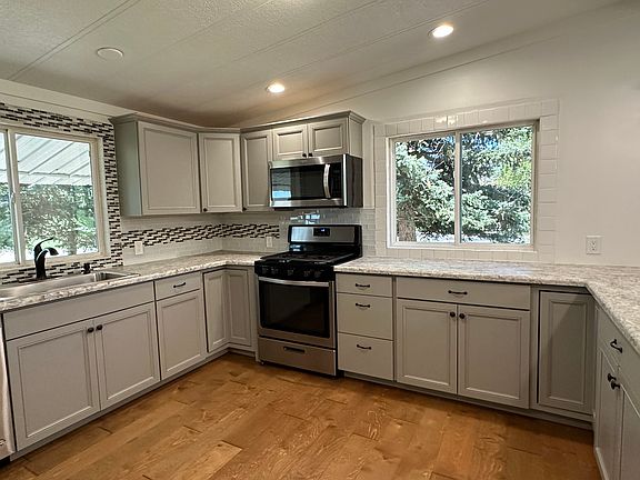 TONS OF STORAGE IN THE NEW KITCHEN CABINETS