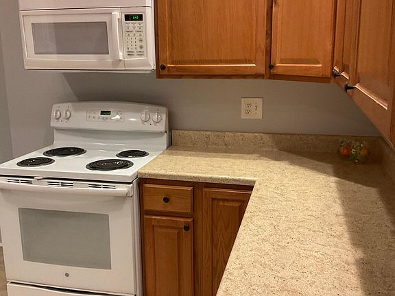 Kitchen stove with built in microwave
