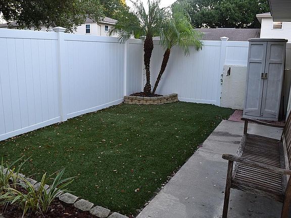 Vinyl fencing back patio/yard