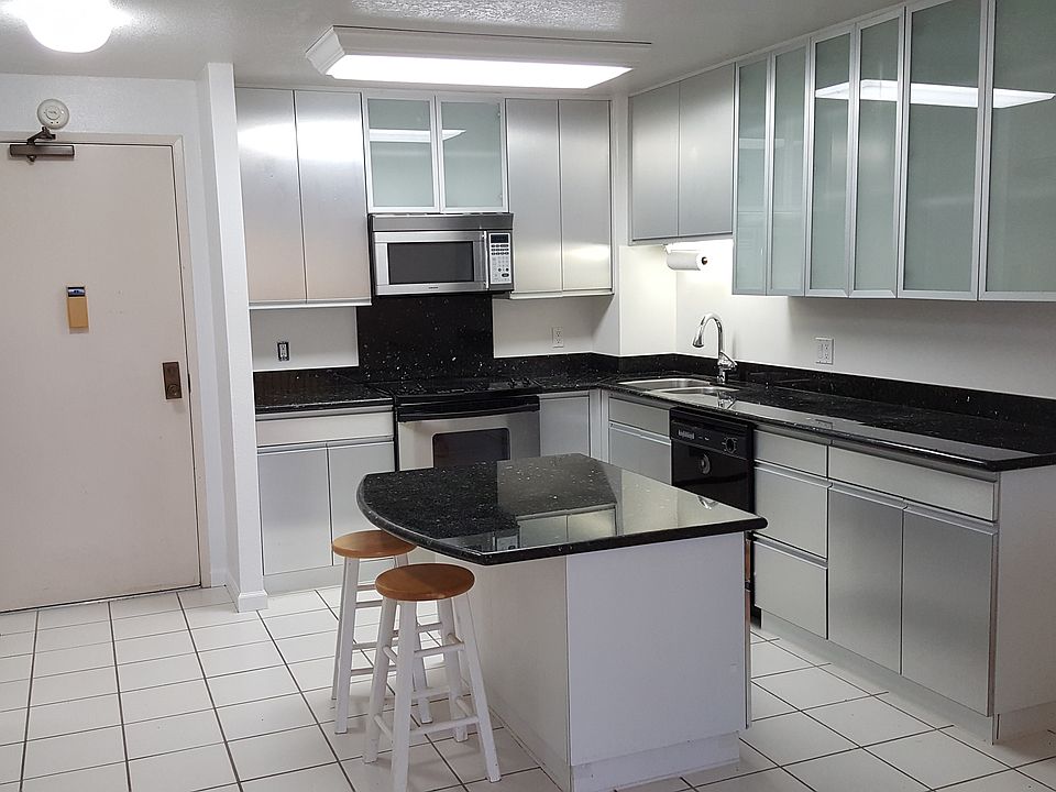 front door and kitchen