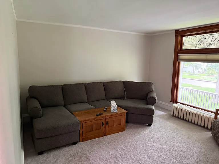 Living room with stained glass.