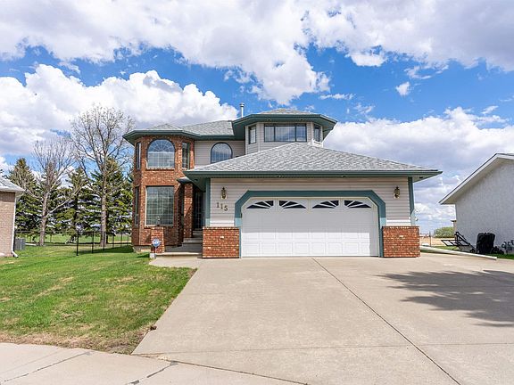 3rd image of 115 Aspen Ridge Cres