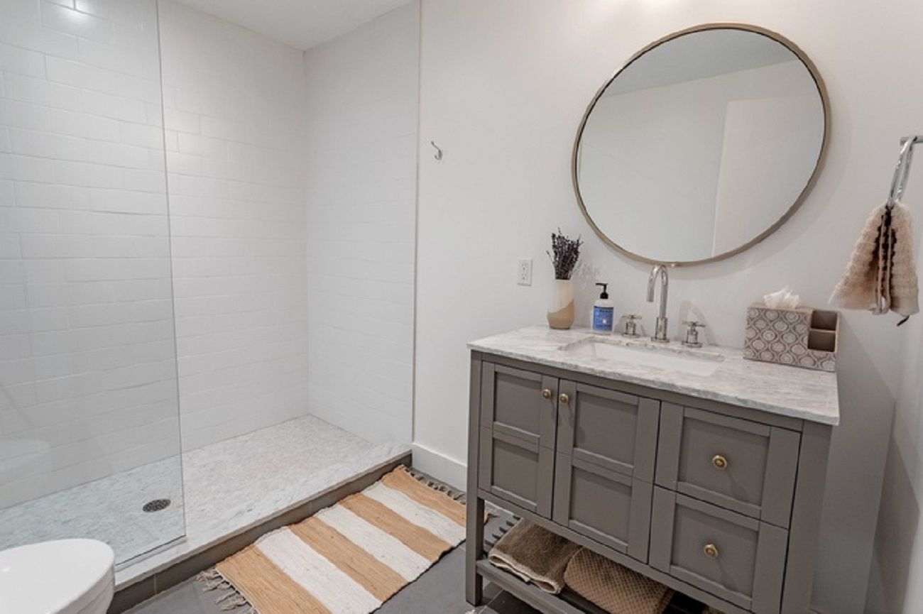 Lower level full bath with showier stall