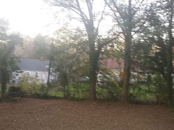 Large fenced level backyard