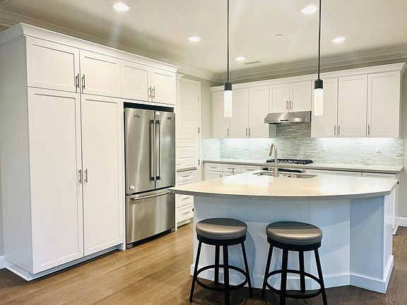 granite countertop and contemporary white cabinets