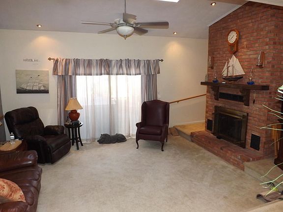 Living Room  w/skylights and gas log FP