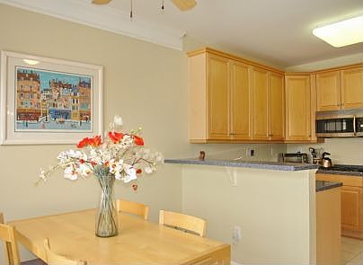 Eating area & breakfast bar w/Corian tops
