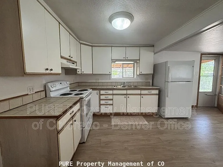 1040 Harlan St — Photo 6