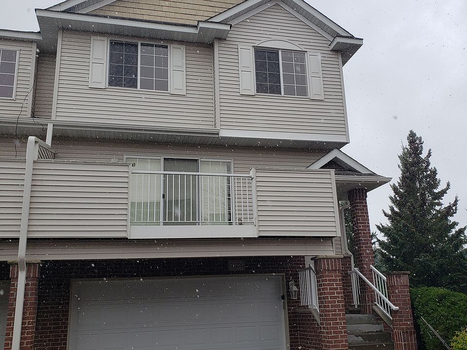 End-unit townhome with attached oversized garage
